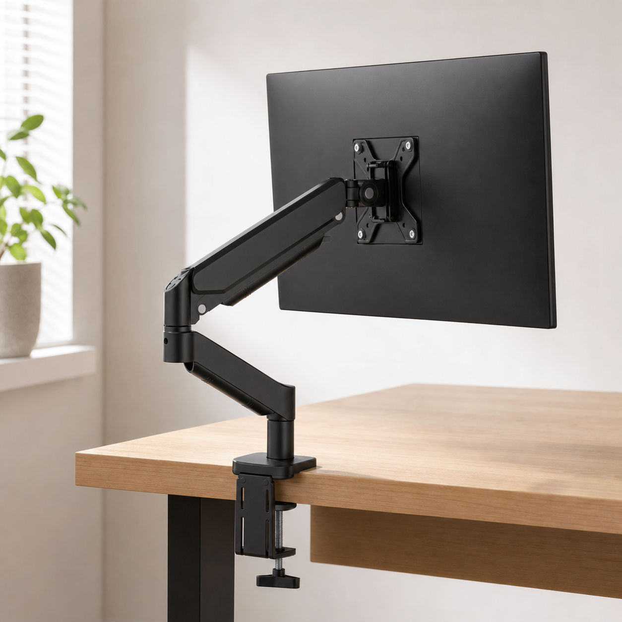 SUPTEK M252 single monitor arm, desk presentation view
